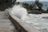 A seawall lets only some waves beyond